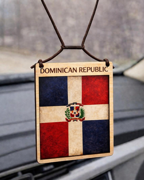 Car air freshener with Dominican Republic flag design hanging from a car's rearview mirror.